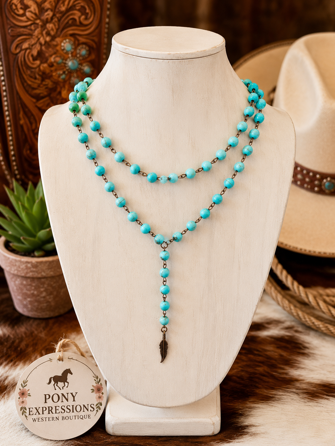 Turquoise beaded necklace with a rustic feather charm. 🩵🤎